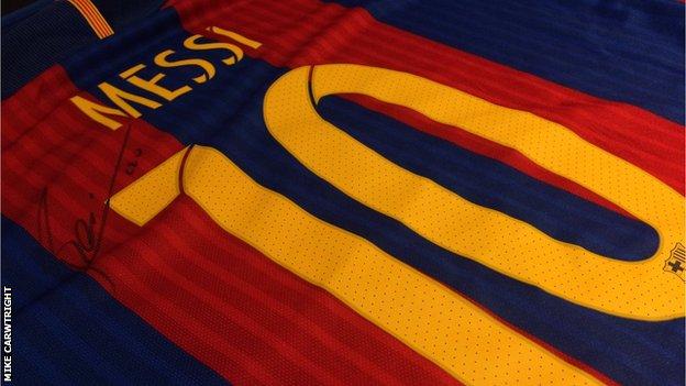 Lionel Messi: Barcelona and Argentina star donates signed shirt