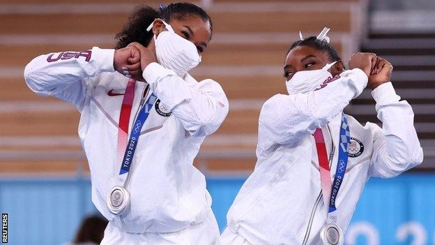 Jordan Chiles and Simone Biles celebrate USA's silver medal in the women's team final at Tokyo 2020