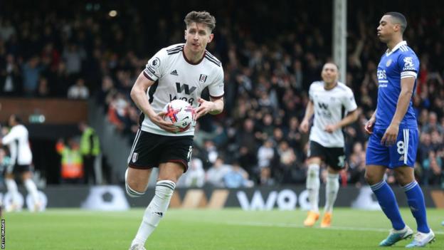 Tom Cairney celebrates scoring for Fulham