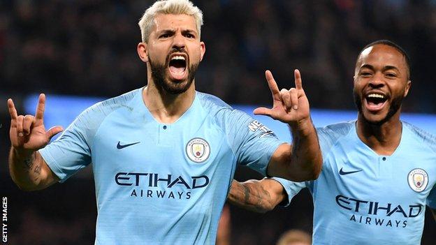 Sergio Aguero and Raheem Sterling celebrate Aguero's winner from the penalty spot against West Ham on 27 February