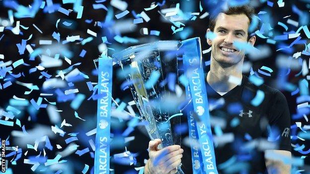 Andy Murray lifts the ATP World Tour Finals trophy