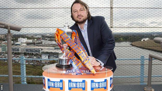 New Saints manager Craig Harrison with the Scottish Challenge Cup