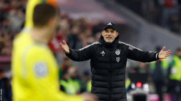 Thomas Tuchel reacts to an official during a match