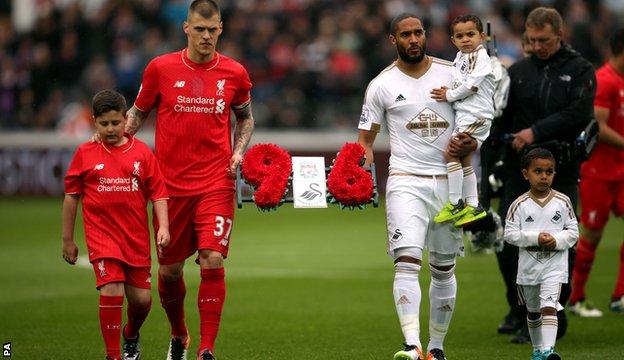 Martin Skrtel (left), Ashley Williams