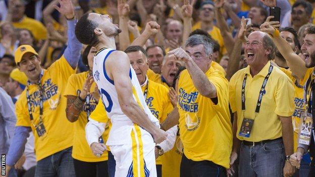Curry celebrates a three-pointer during Golden State's win