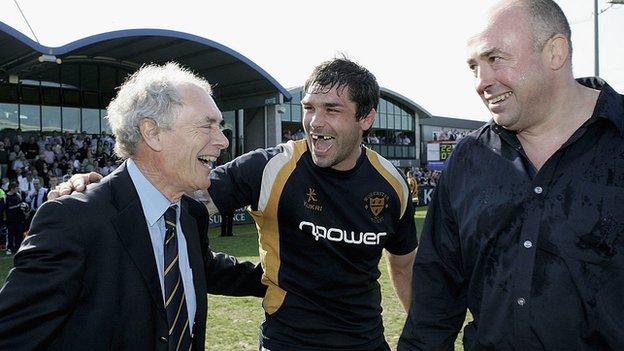 Owner Cecil Duckworth celebrated Worcester's first promotion to the Premiership in 2004 with skipper Pat Sanderson and coach John Brain