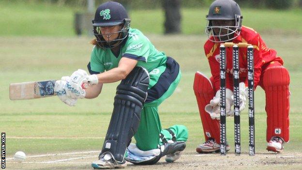 Isobel Joyce attempts a sweep shot in Ireland's innings in Harare