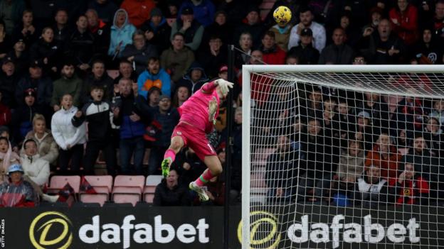 Philip Billing's second-half shot loops over Burnley goalkeeper James Trafford in Bournemouth's Premier League game against the Clarets