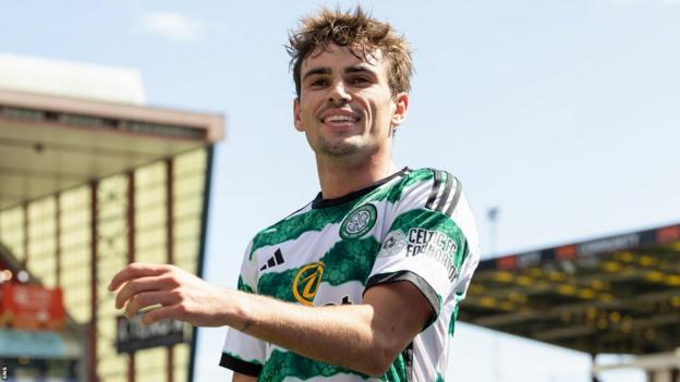 Matt O'Riley celebrates scoring for Celtic against Aberdeen