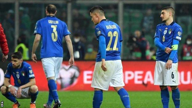 Dejected Italy players