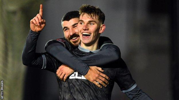 Liam Shaw celebrates with Sheffield Wednesday team-mate Callum Paterson