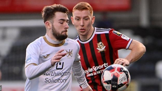 Ross Hunter and Jarlath O'Rourke in action at Seaview