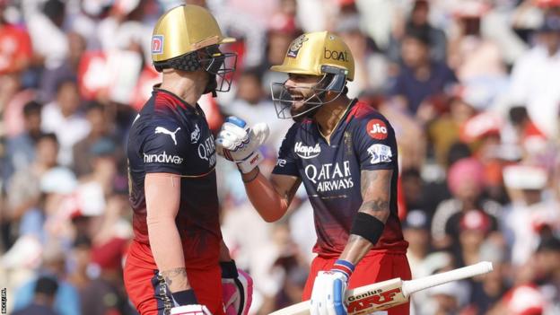 Faf du Plessis and Virat Kohli bump fists while batting together for Royal Challengers Bangalore