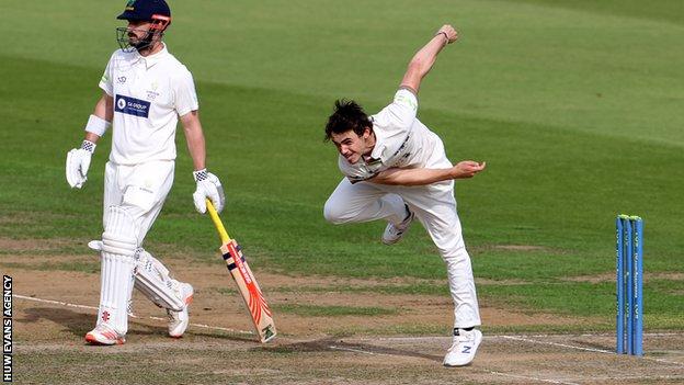 Tom Price bowls against Glamorgan