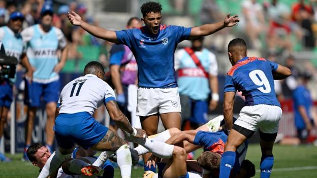 Namibia wing Gerswin Mouton opens his arms out in frustration standing over a ruck during the France Rugby World Cup 2023 pool match against Italy