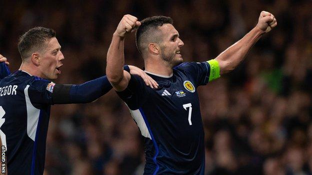 John McGinn captained Scotland to a 3-0 win over Ukraine