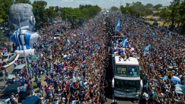 Millions of ecstatic fans took to the streets of Buenos Aires to welcome Argentina's World Cup men's winning team back home
