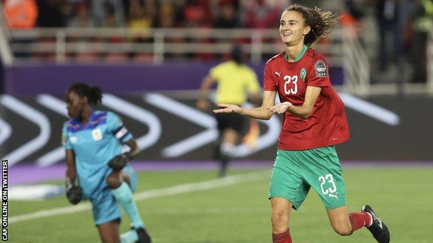 Rosella Ayane (right) celebrates a goal for Morocco