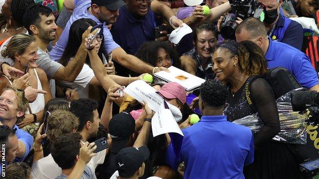 Serena Williams with fans after her US Open first-round match
