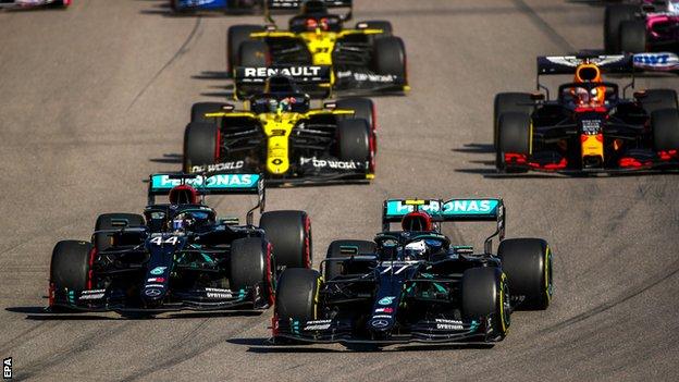 Valtteri Bottas passes Lewis Hamilton at the start of the Russian Grand Prix