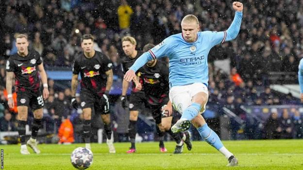 Erling Haaland scores a penalty for Manchester City