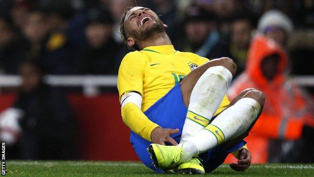 Neymar goes down injured