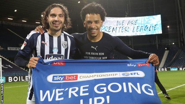 Filip Krovinovic and Matheus Pereira of West Bromwich Albion celebrate promotion to the Premier League