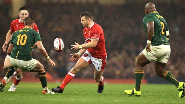 Wales captain Dan Biggar passes to Josh Adams against South Africa