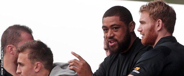 Taulupe Faletau watches from the stands