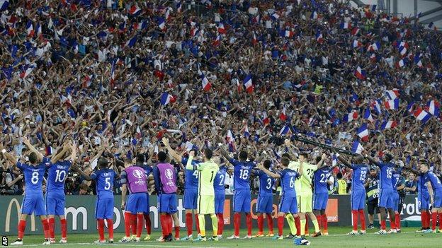 France fans celebrate with the France team