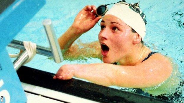 Sarah Storey stares at the clock after shattering her own 200m backstroke record by over six seconds in 1993