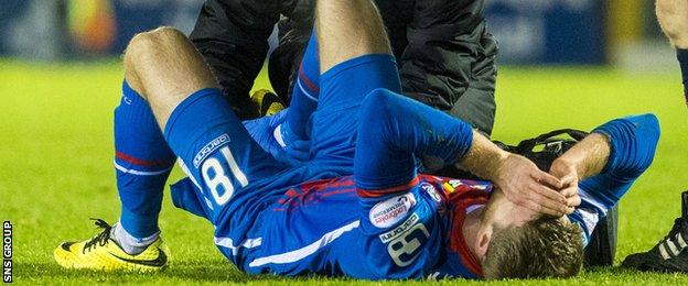 Alex Fisher was hurt after coming on as a second-half substitute