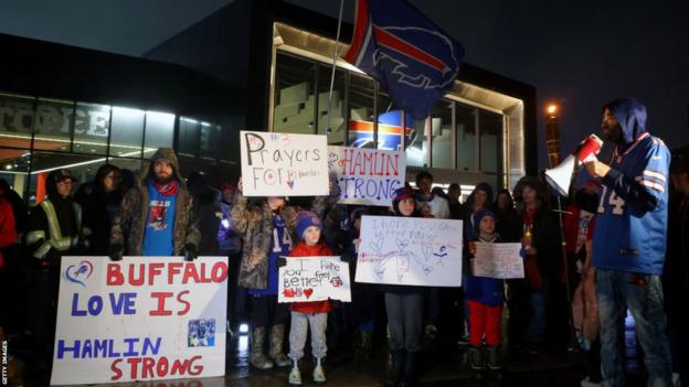 Buffalo Bills fans attend a candlelight prayer vigil for player Damar Hamlin