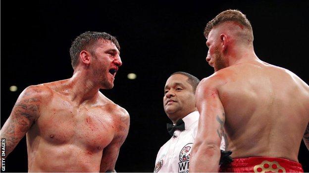 Nathan Cleverly confronts Andrzej Fonfara at the end of a round