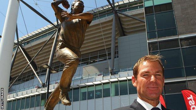 Shane Warne poses during the unveiling of the Shane Warne statue at the Melbourne Cricket Ground on December 22, 2011