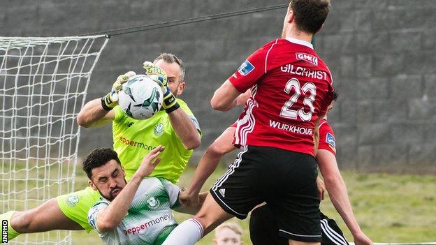 Rovers keeper Alan Mannus comes out to deny Derry's Ally Gilchrist in Friday night's game