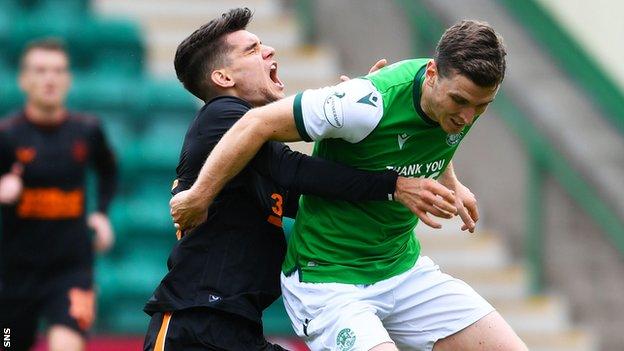 Ianis Hagi clashes with Paul Hanlon