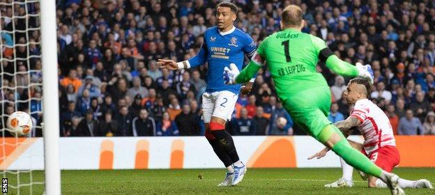 Rangers captain James Tavernier (left) scores against RB Leipzig