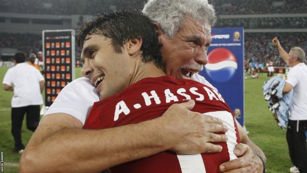 Hassan Shehata and Ahmed Hassan celebrate after Egypt win the 2010 Africa Cup of Nations