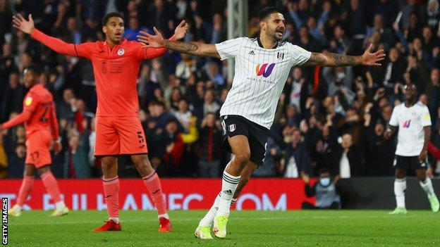 Aleksandar Mitrovic celebrates his opening goal as Ben Cabango's legitimate claim for offside is ignored