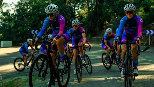 Riders of the Hess cycling team prepare to begin a race