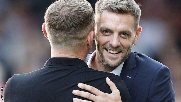 Jonathan Woodgate embraces Graeme Jones