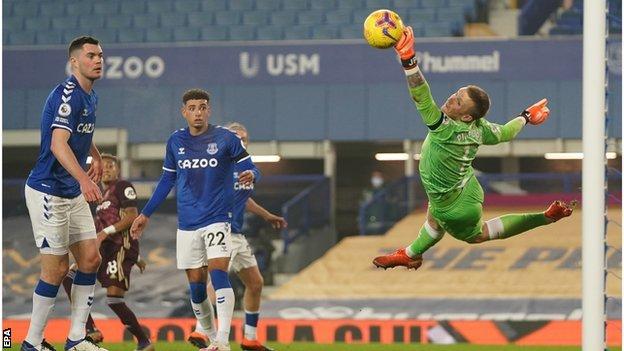 Everton goalkeeper Jordan Pickford denies Raphinha a goal with save in the Premier League match with Leeds United at Goodison Park