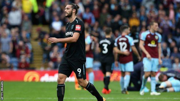 Andy Carroll walks off after being dismissed at Turf Moor in October