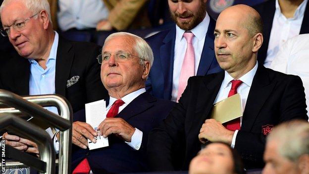 Arsenal's chairman Sir Chips Keswick (L) and chief executive officer Ivan Gazidis at a Champions League game in 2016
