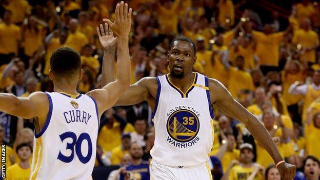 Stephen Curry and Kevin Durant celebrate
