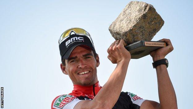 Belgium's Greg van Avermaet hold up the cobbled trophy for winning Paris-Roubaix 2017