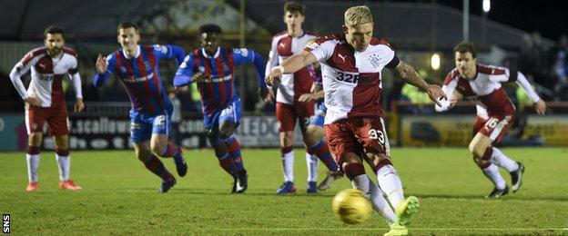 Martyn Waghorn beats Owain Fon Williams from the penalty spot to make it 1-1 in Inverness