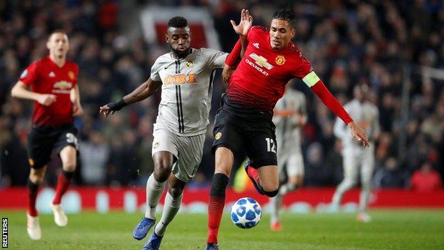 Jean-Pierre Nsame in action for Young Boys Bern against Manchester United's Chris Smalling in the Uefa Champions League
