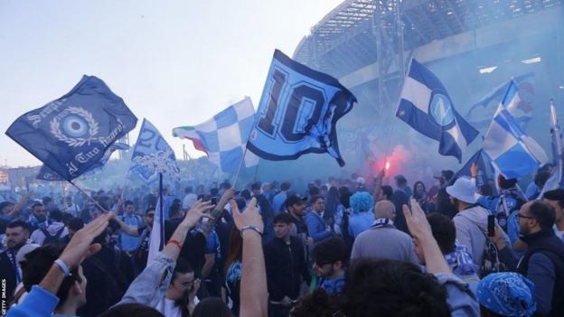 Napoli fans besides  watched the lucifer  via large  screens astatine  their ain  Stadio Diego Armando Maradona